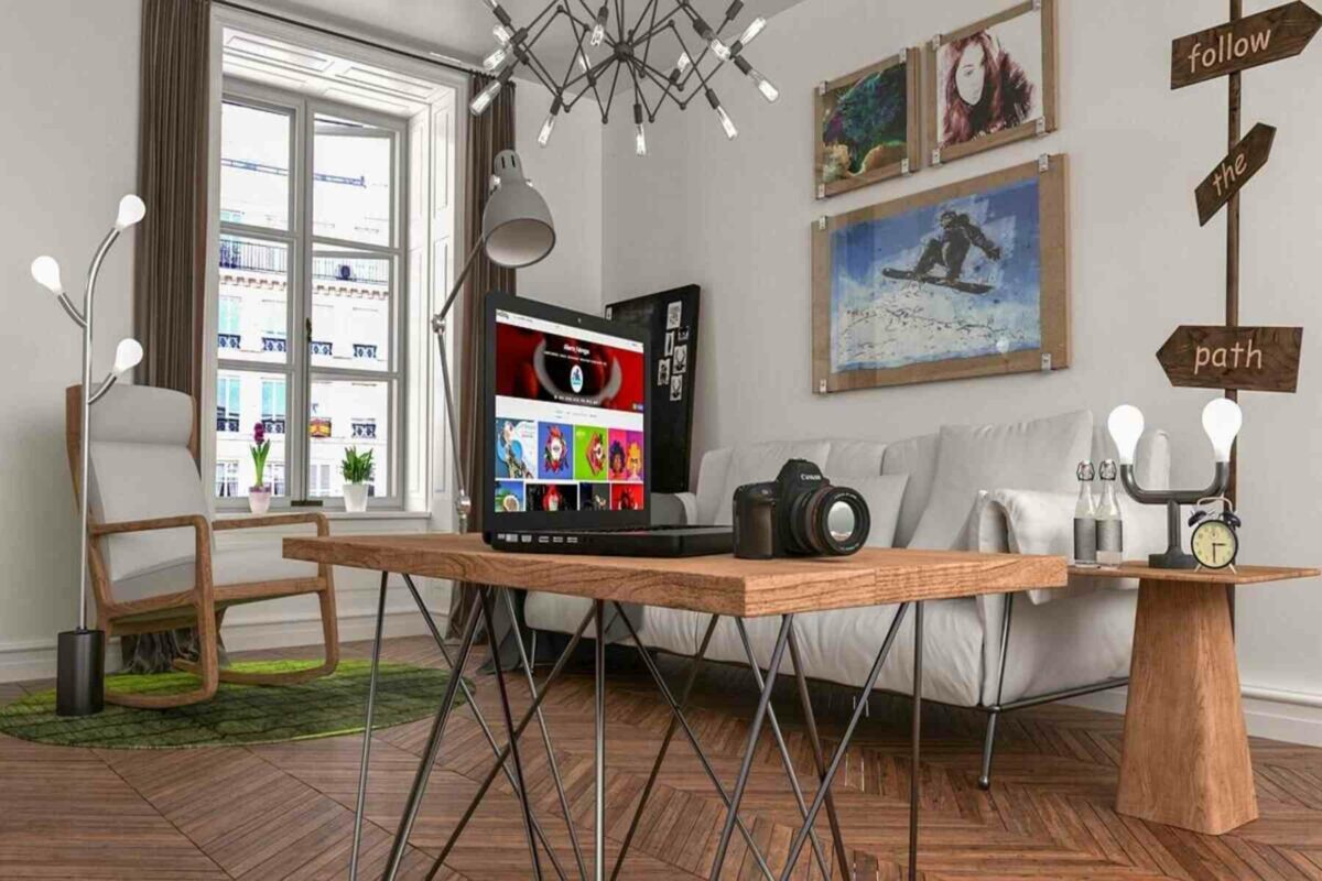 A room with a laptop and high-quality camera setup placed on the wooden table
